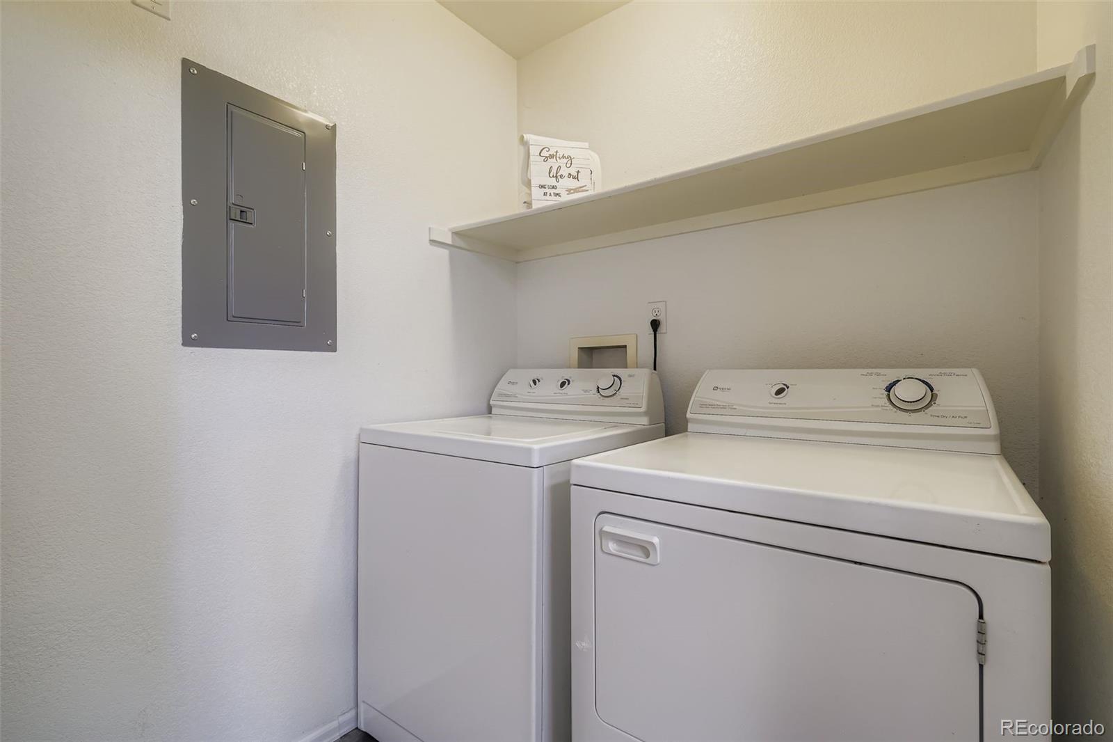 283 Ellers Grove Colorado Springs, CO 80916 - Photo 15 of 17 a utility room with dryer and washer