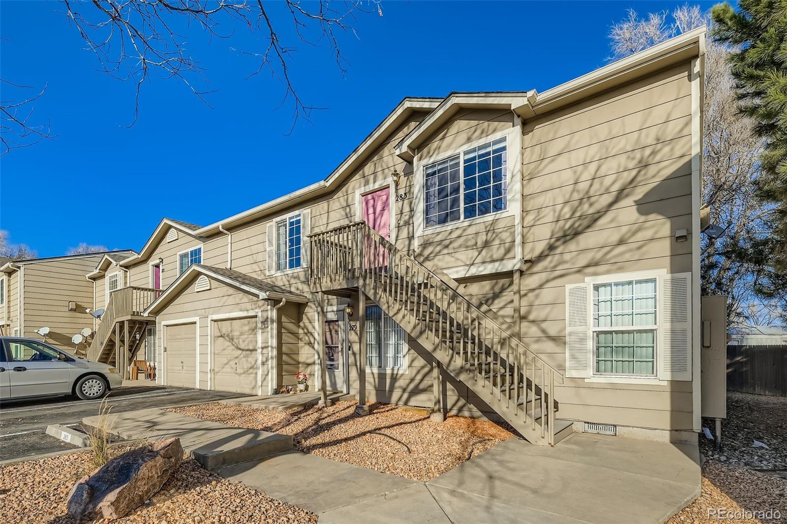 283 Ellers Grove Colorado Springs, CO 80916 - Photo 2 of 17 a view of a house with a yard