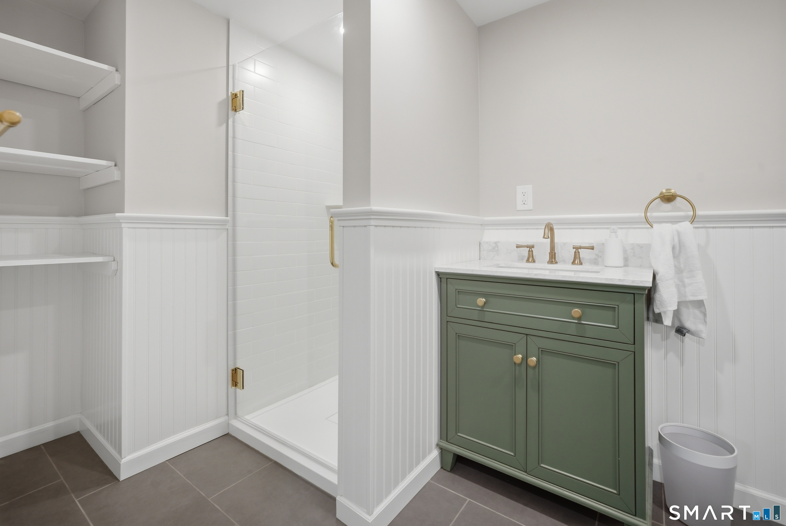 96 Toll House Lane Fairfield, CT 06825 - Photo 20 of 29 a bathroom with a sink a toilet and shower