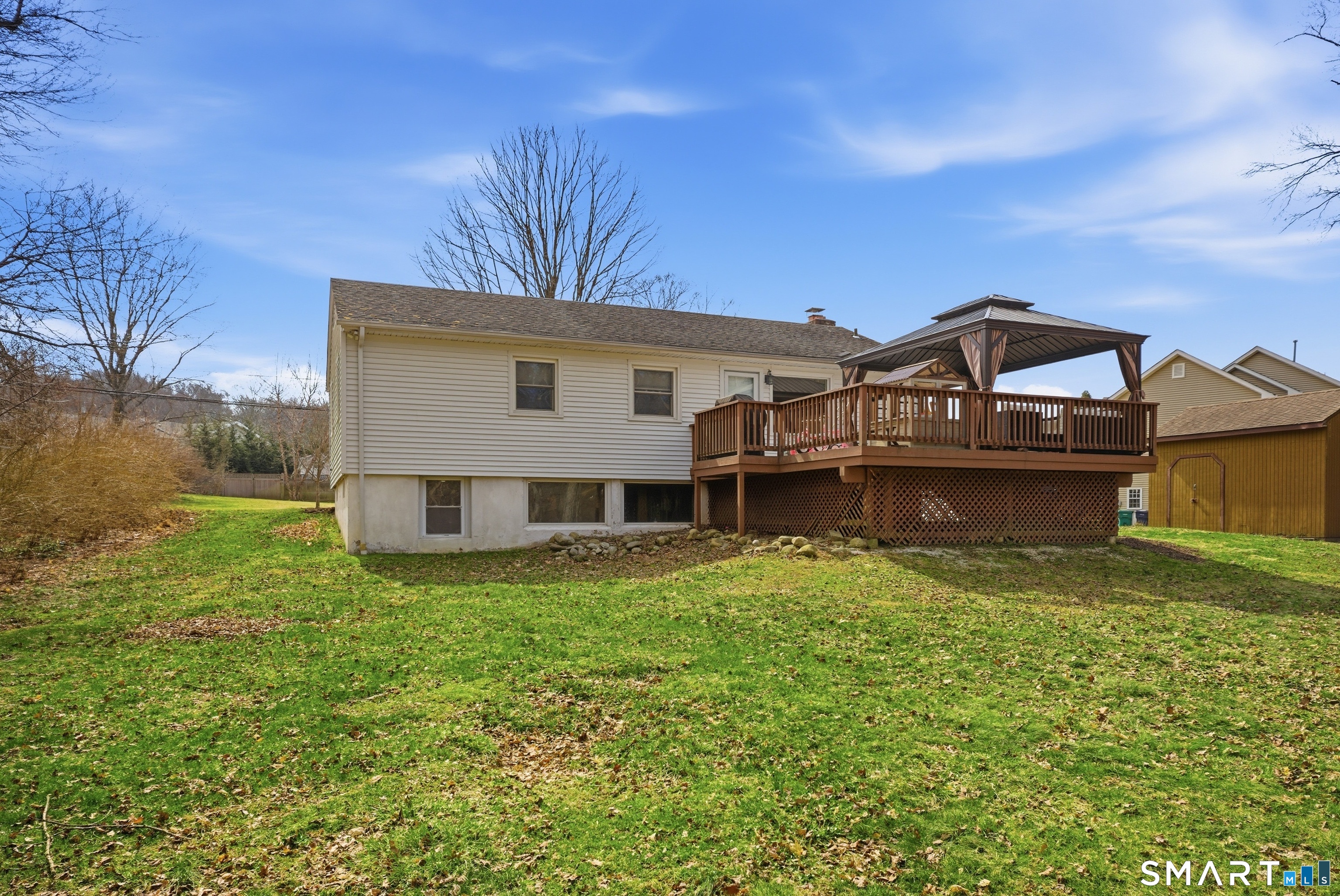 96 Toll House Lane Fairfield, CT 06825 - Photo 24 of 29 a view of a house with a big yard