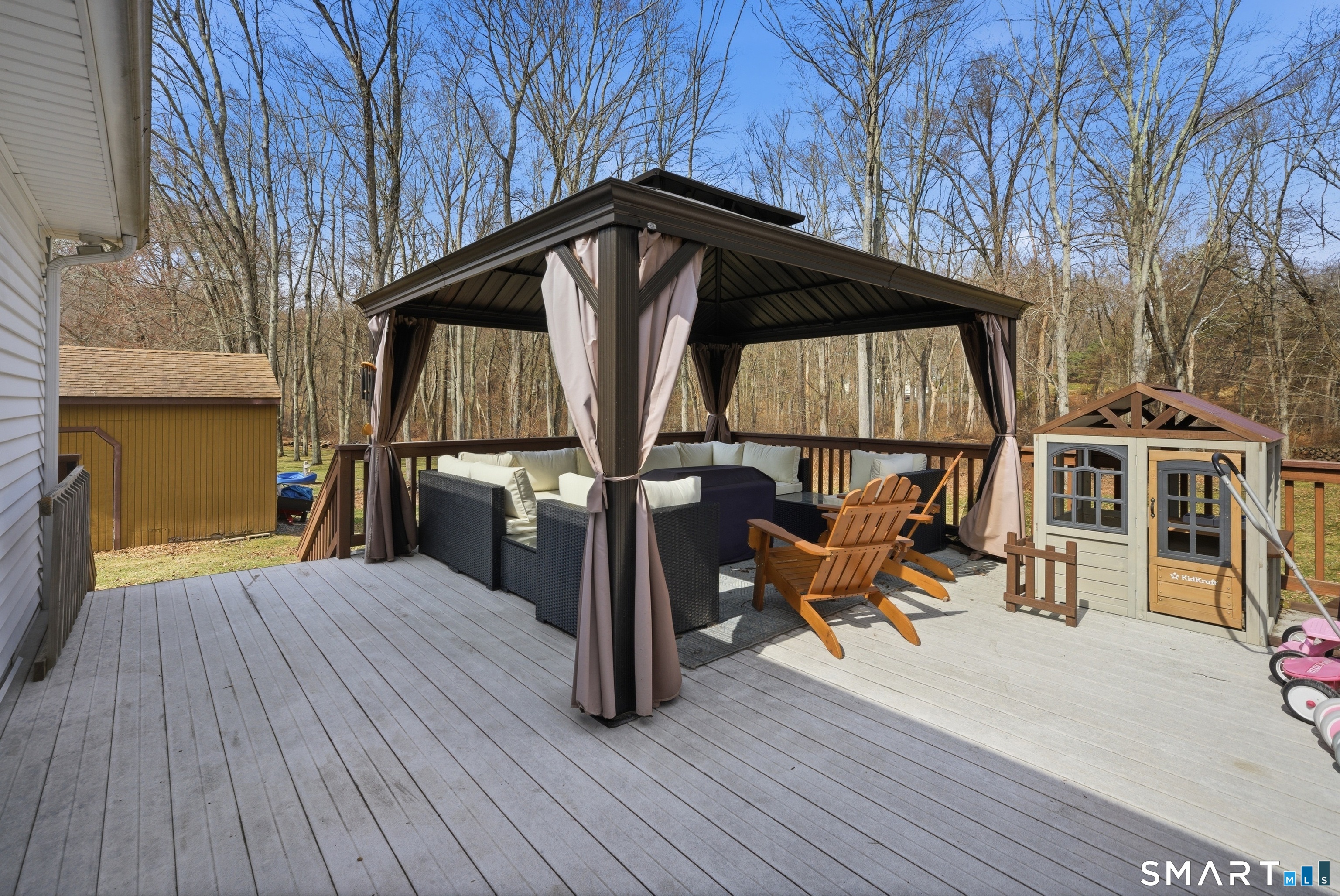 96 Toll House Lane Fairfield, CT 06825 - Photo 28 of 29 a view of a house with backyard and sitting area