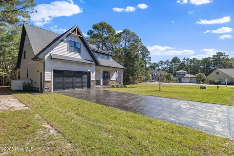 $850,000 | 613 Riverwood Drive Southeast, Bolivia, NC 28422