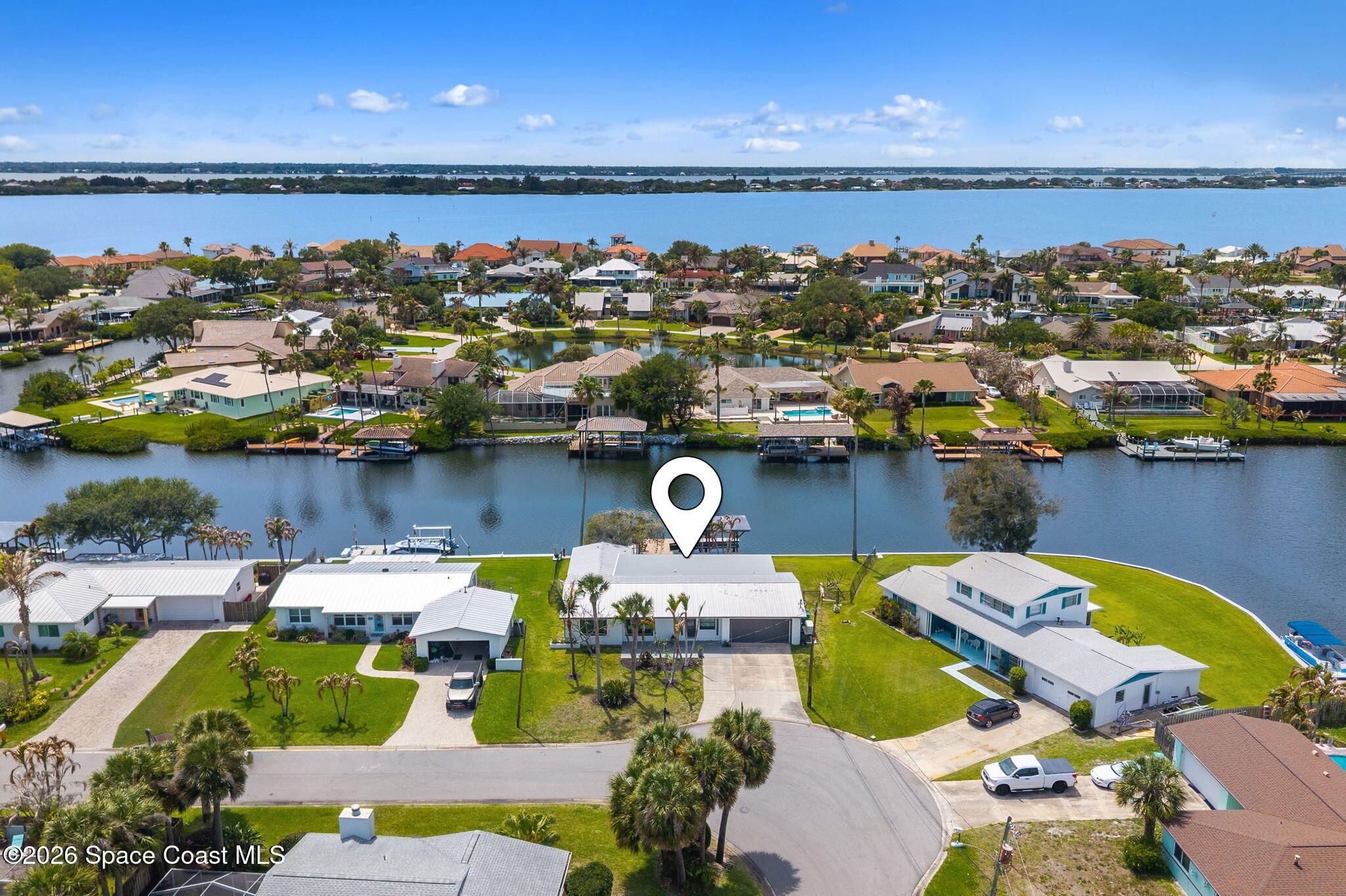 213 River Road Satellite Beach, FL 32937 - Photo 4 of 63 DJI_20260429144121_0265_D_1-Edit