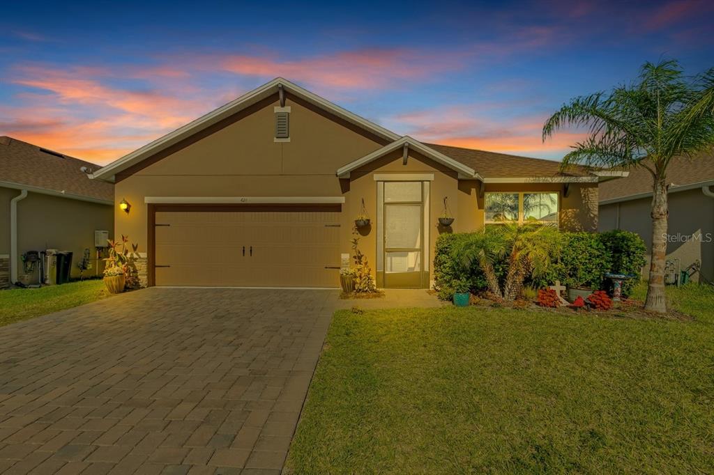 424 Lazio Circle DeBary, FL 32713 - Photo 1 of 1 a front view of house with yard