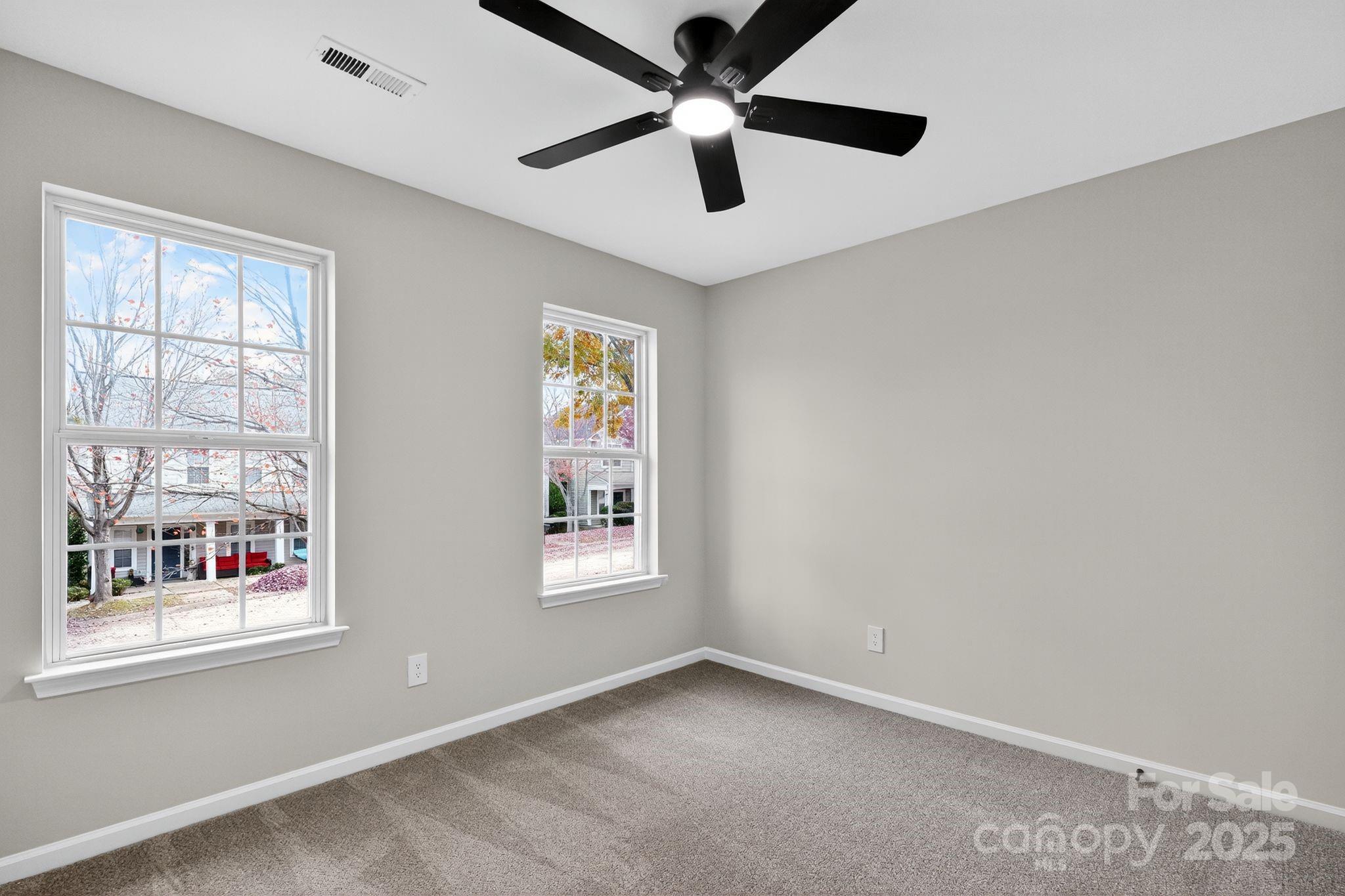 11227 Suunto Lane Cornelius, NC 28031 - Photo 13 of 20 a view of an empty room with a window