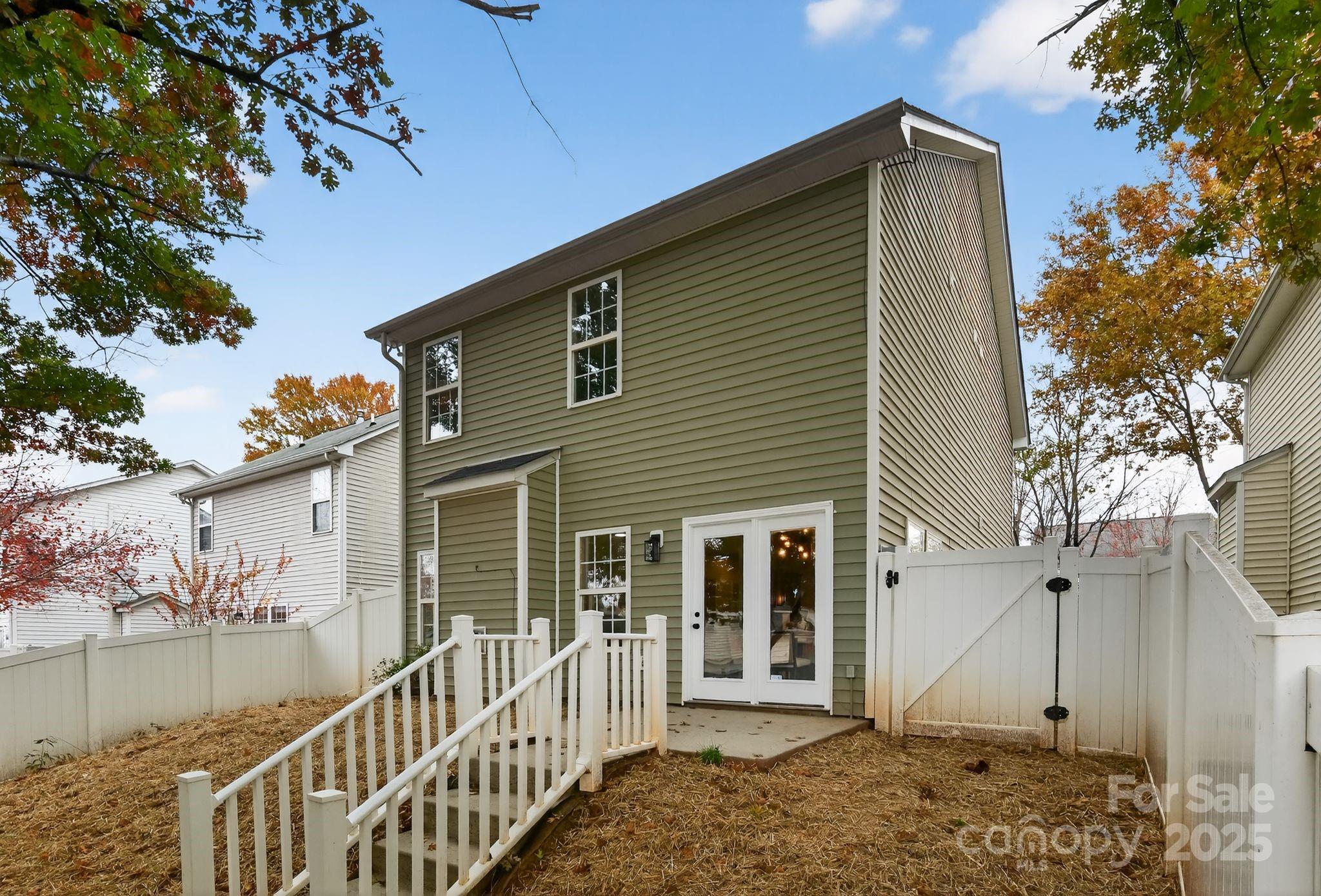 11227 Suunto Lane Cornelius, NC 28031 - Photo 17 of 20 a front view of a house with a porch