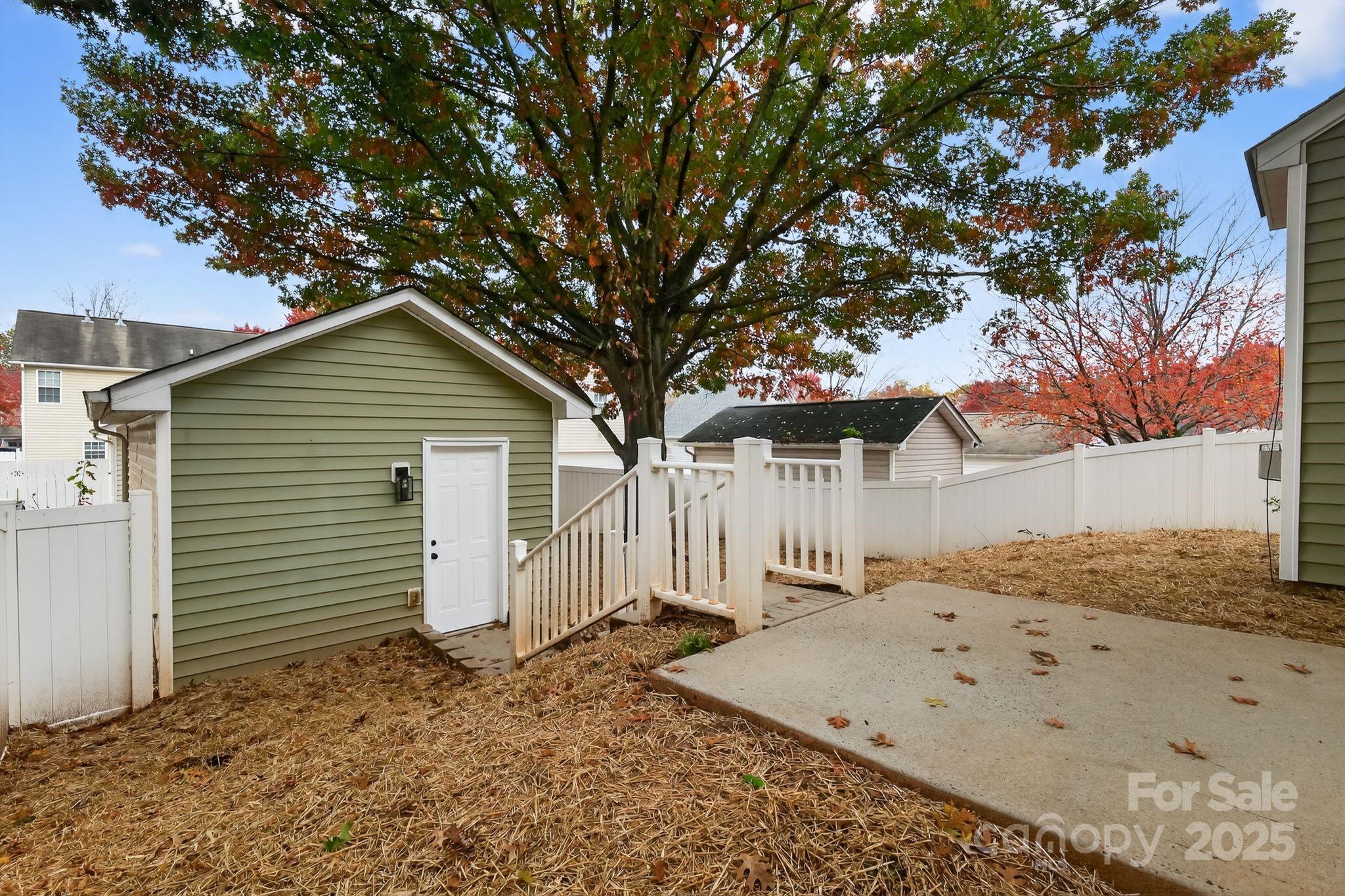 11227 Suunto Lane Cornelius, NC 28031 - Photo 19 of 20 a view of a house with a yard