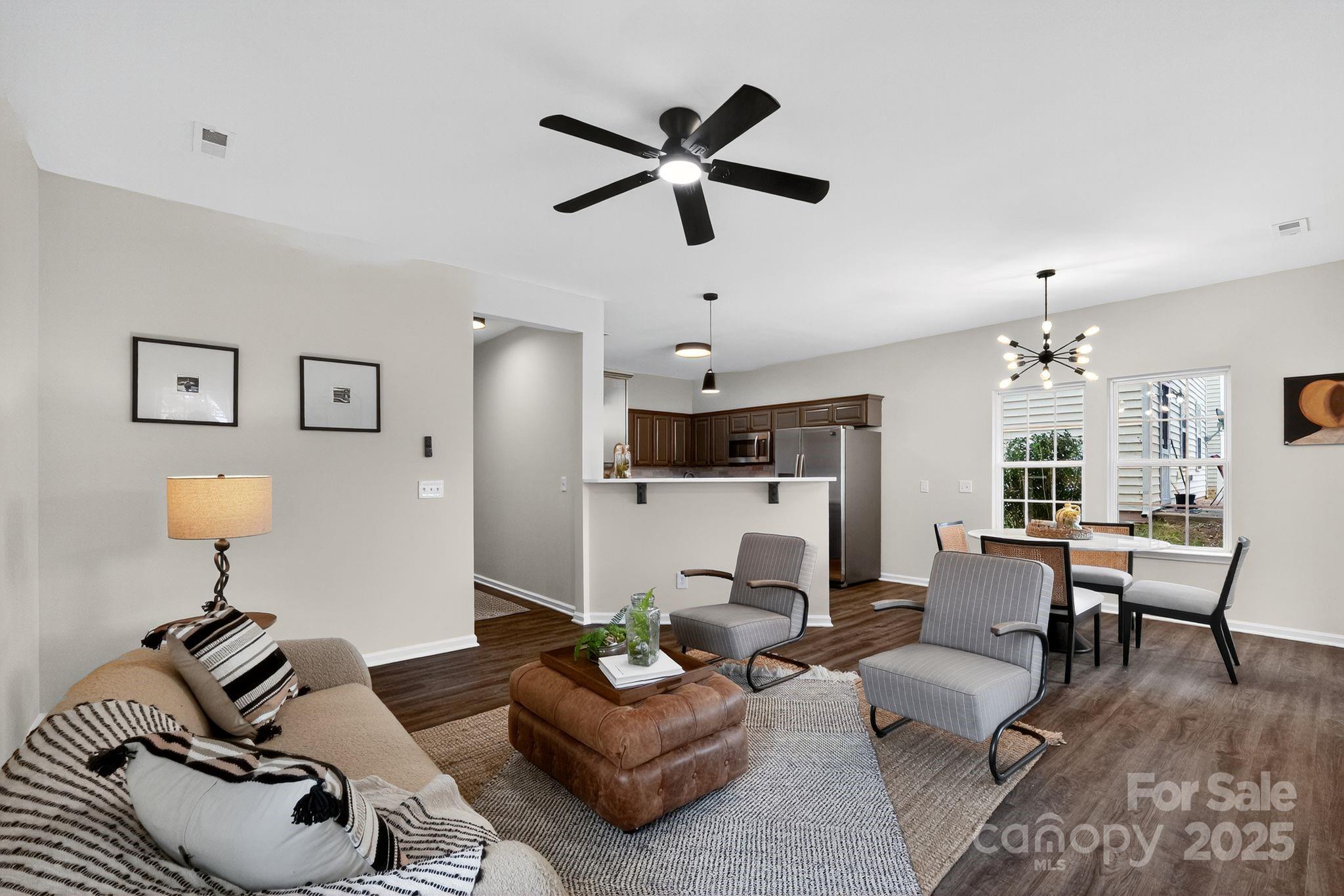 11227 Suunto Lane Cornelius, NC 28031 - Photo 5 of 20 a living room with furniture and a large window