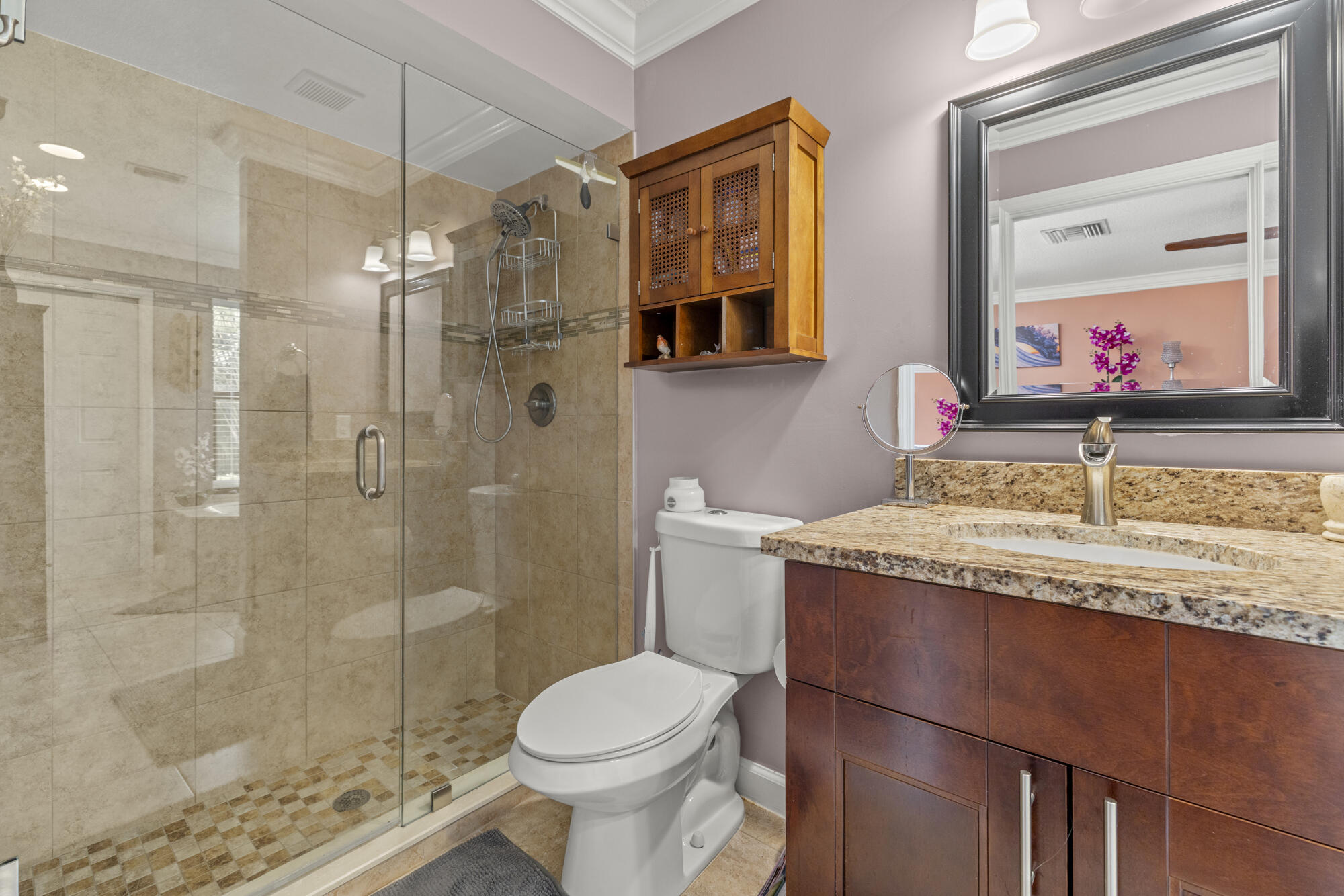 591 Kriss Lane Jupiter, FL 33458 - Photo 15 of 36 a bathroom with a granite countertop sink toilet and shower