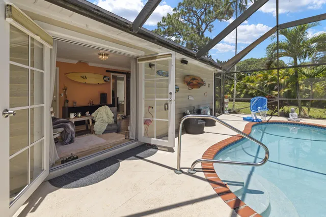 a view of a outdoor space with a patio and fire pit
