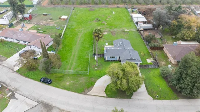 a view of a house with a big yard