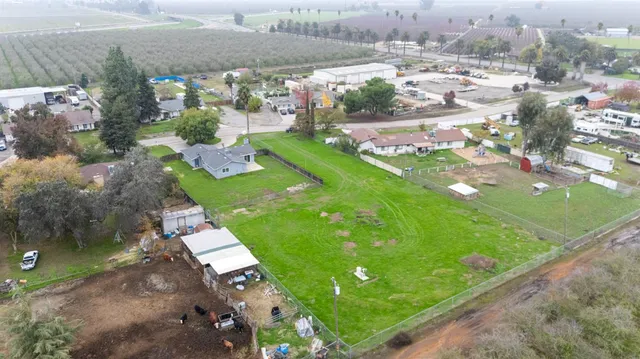 a view of a building with a big yard