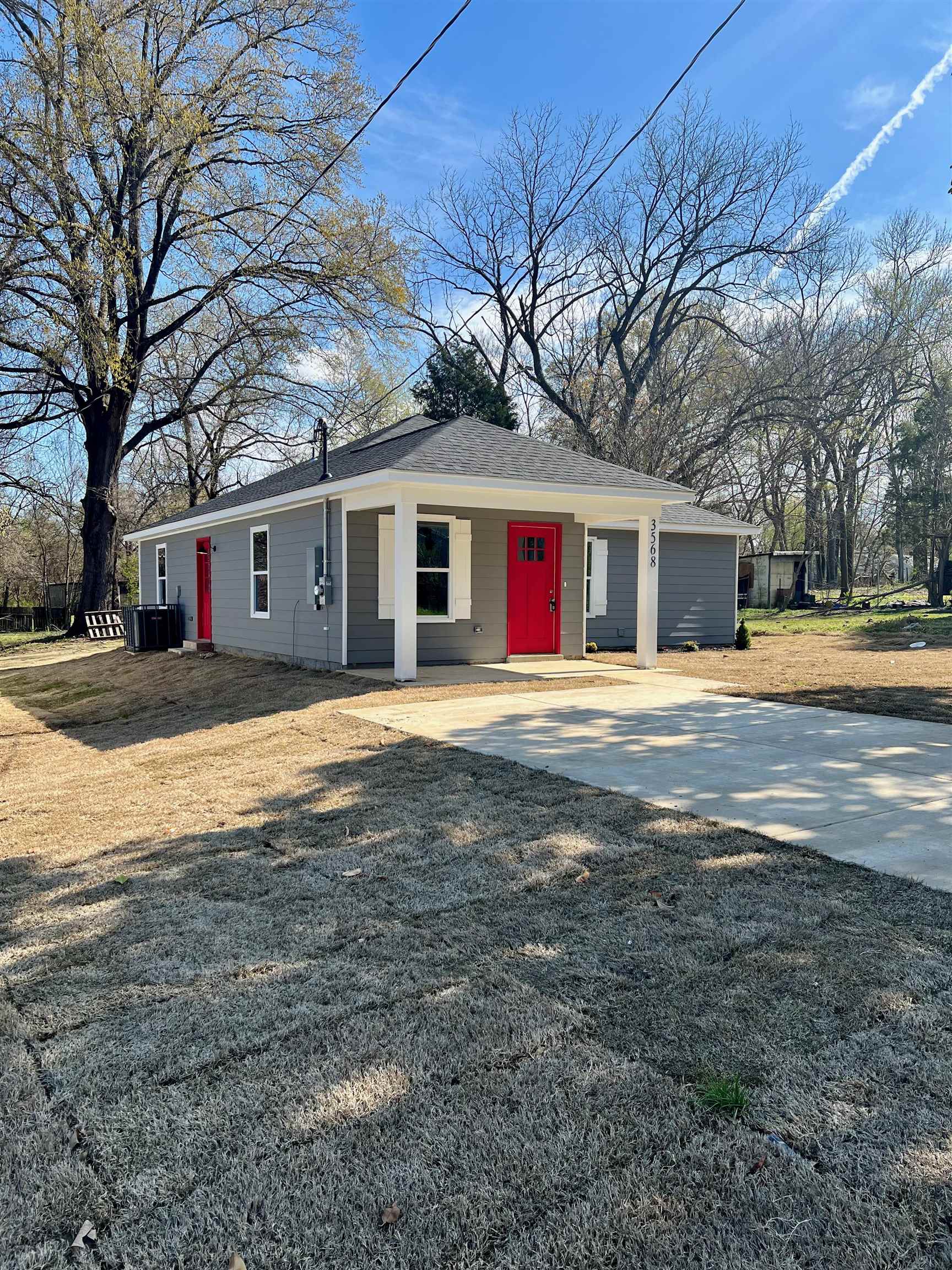 3602 Orchi Road Memphis, TN 38108 - Photo 3 of 19 a view of a house with a yard and trees
