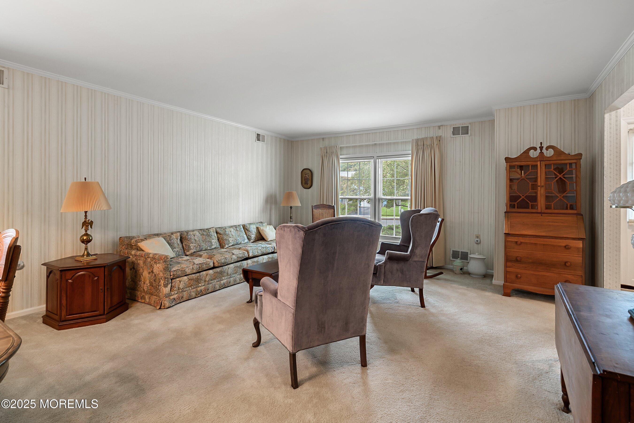 4 Olympus Way Brick, NJ 08724 - Photo 5 of 31 a living room with furniture and a window