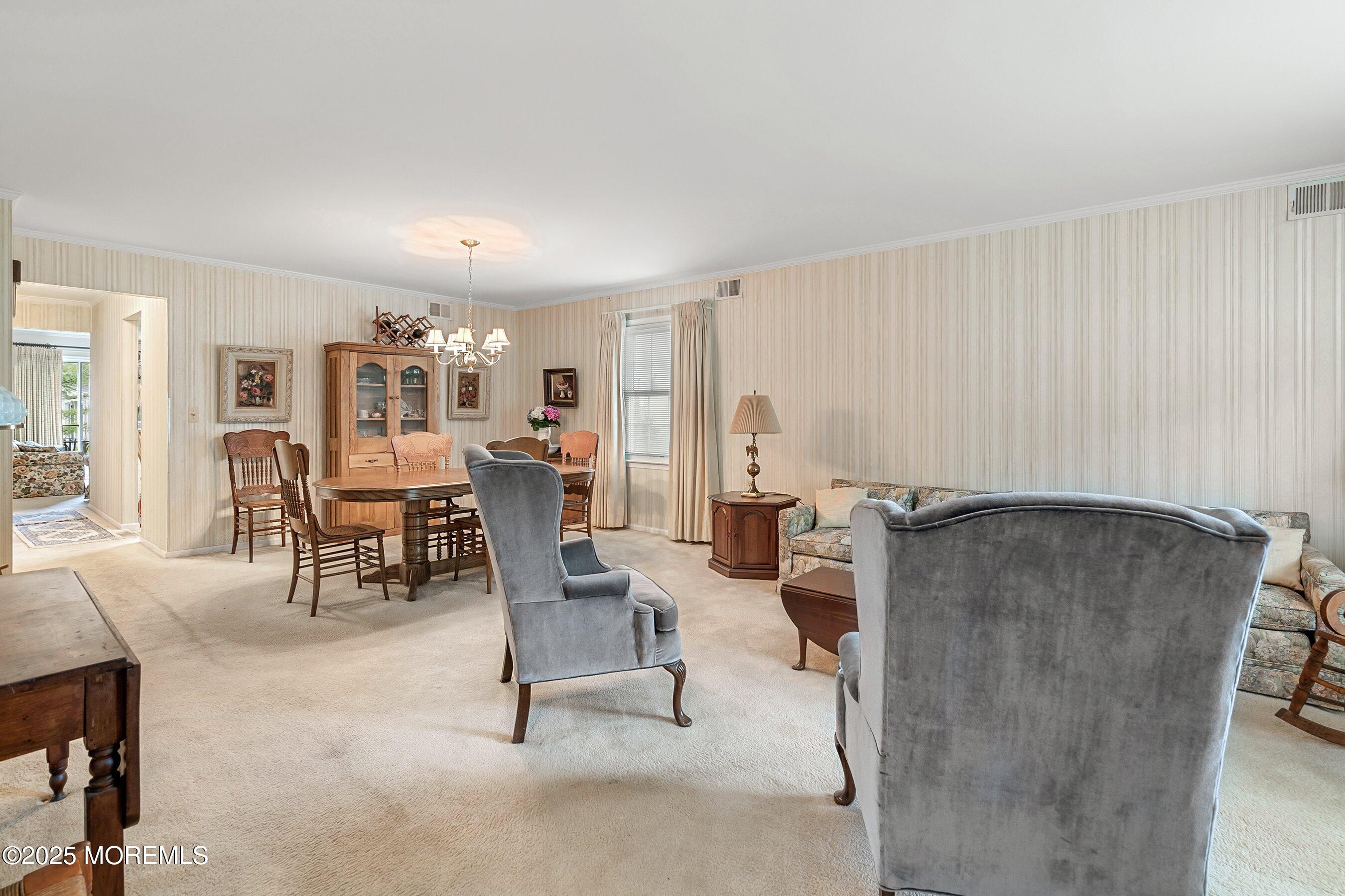 4 Olympus Way Brick, NJ 08724 - Photo 8 of 31 a living room with furniture and large windows