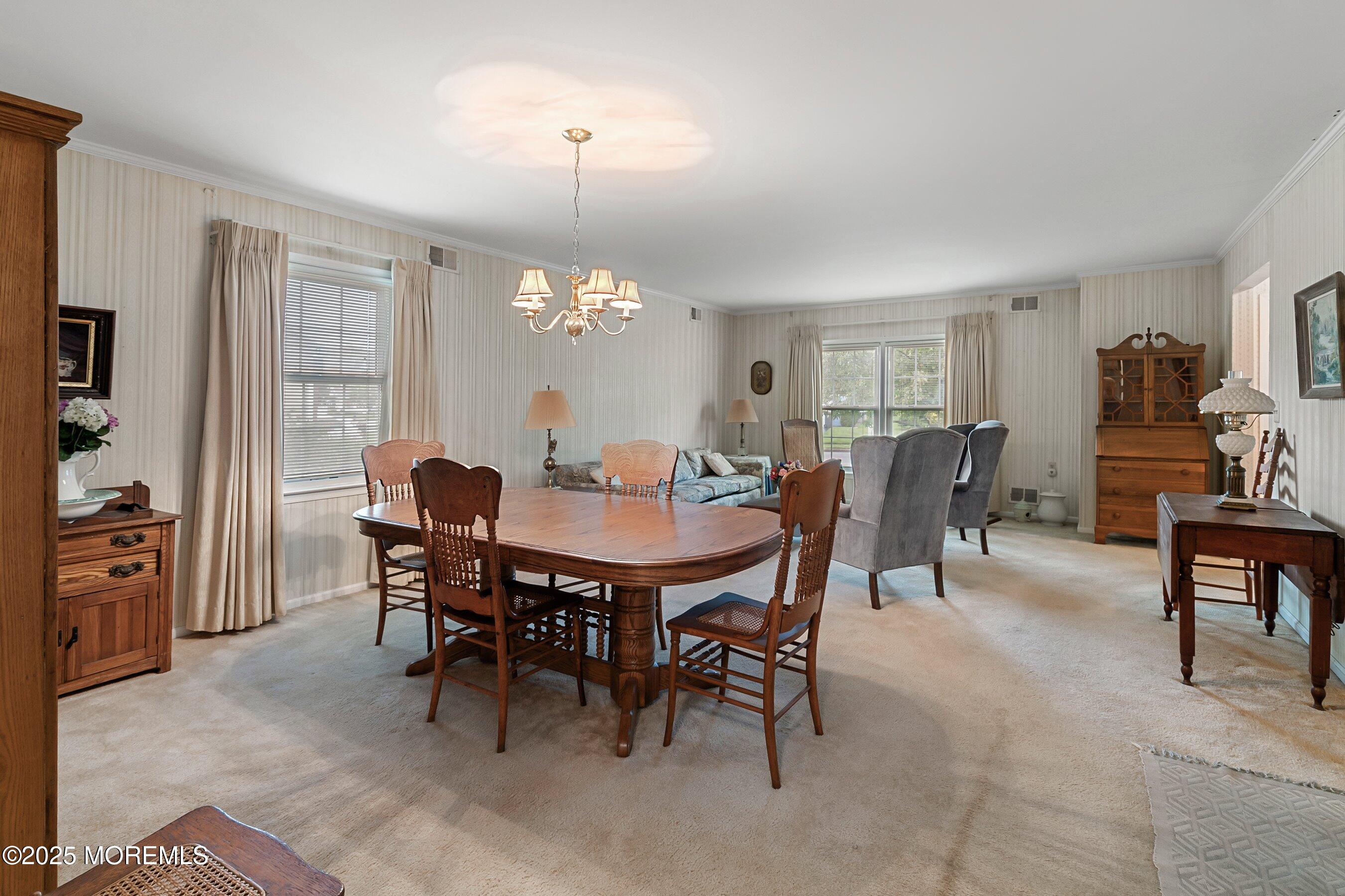 4 Olympus Way Brick, NJ 08724 - Photo 9 of 31 a view of a dining room with furniture and chandelier