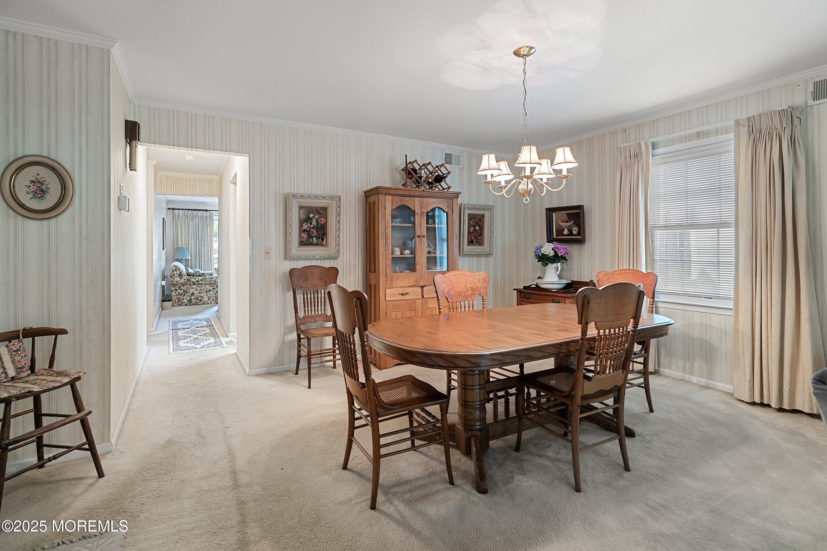 4 Olympus Way Brick, NJ 08724 - Photo 10 of 31 a view of a dining room with furniture and chandelier