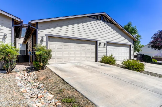 a view of a house with a large window