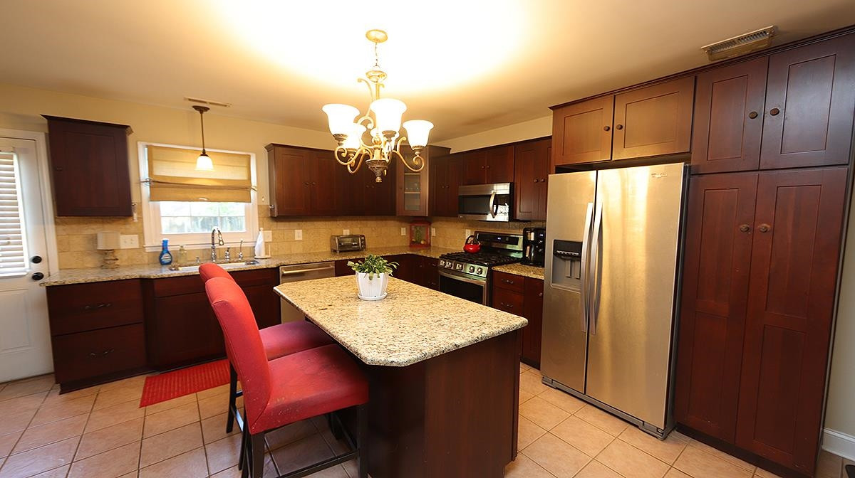 3016 Old Orchard Road Raleigh, NC 27607 - Photo 8 of 39 Gas Stove, Built in Microwave PLUS Stainless Steel Dishwasher and Refrigerator Completes this Chef's Dream ! Chef's Delight !