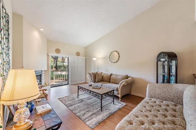 a living room with furniture rug and window