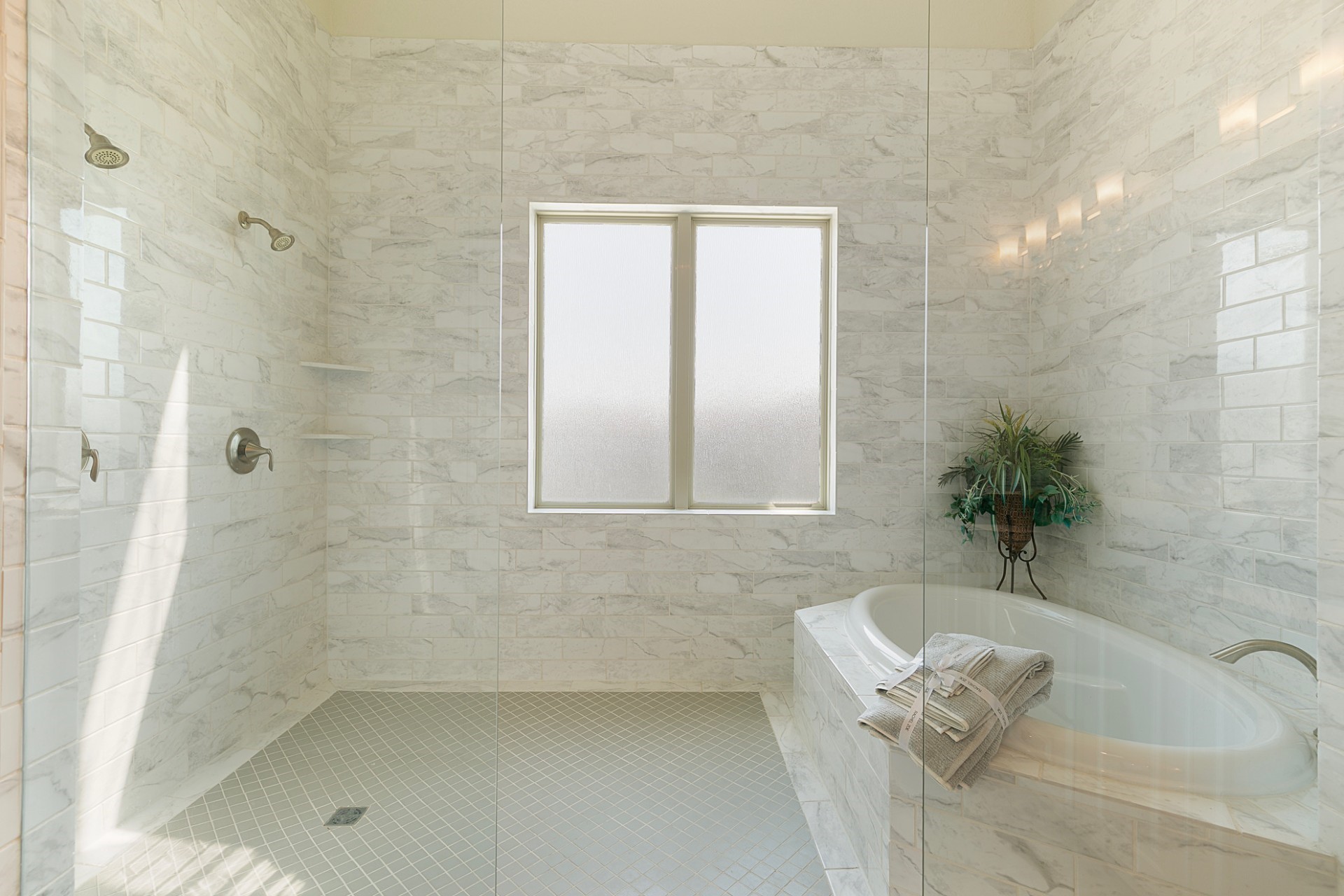1415 Maple Stream Drive Houston, TX 77043 - Photo 20 of 29 a bathroom with a bathtub and shower
