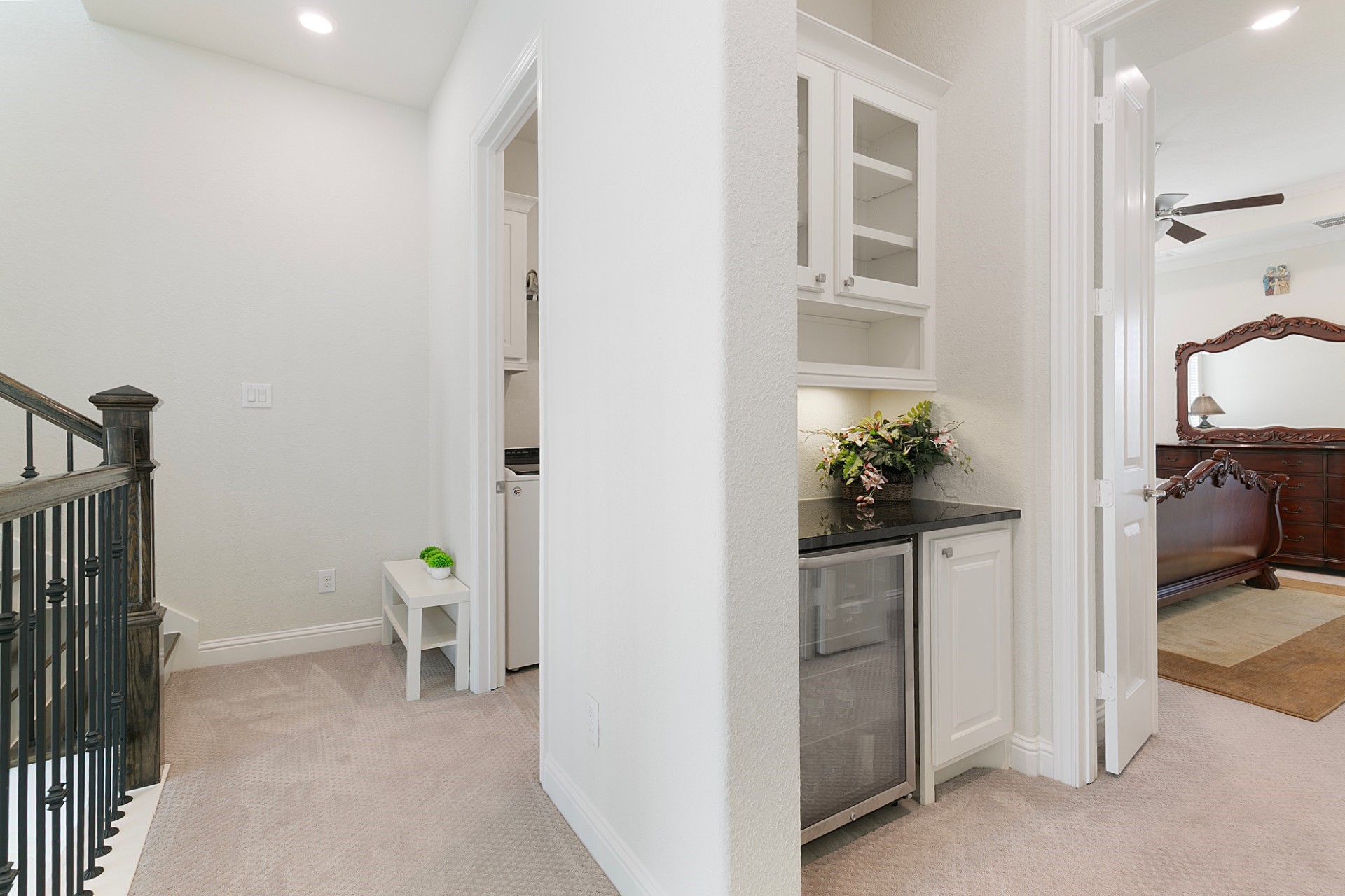1415 Maple Stream Drive Houston, TX 77043 - Photo 24 of 29 a view of a hallway with a livingroom and a workspace
