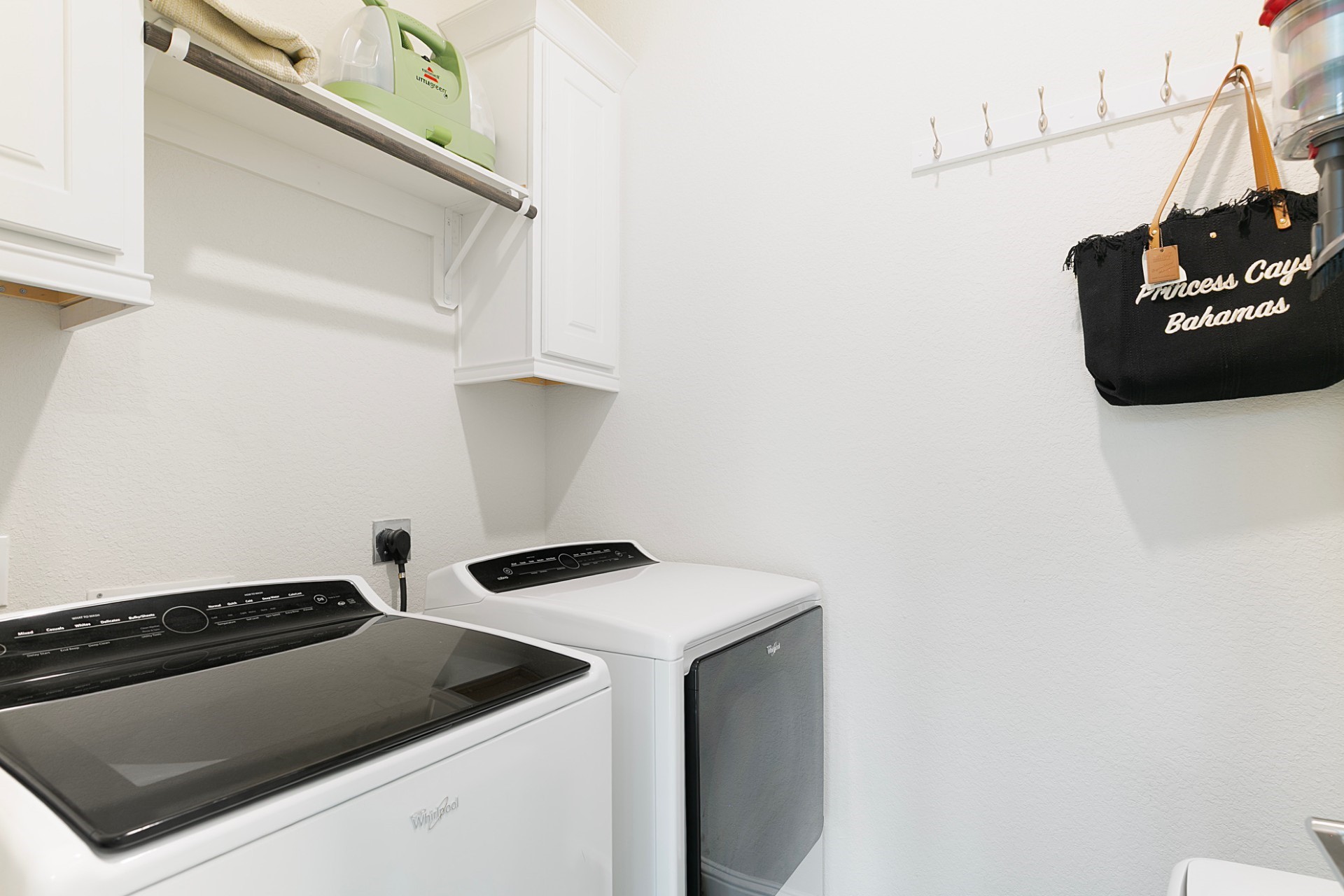 1415 Maple Stream Drive Houston, TX 77043 - Photo 25 of 29 a utility room with dryer and washer