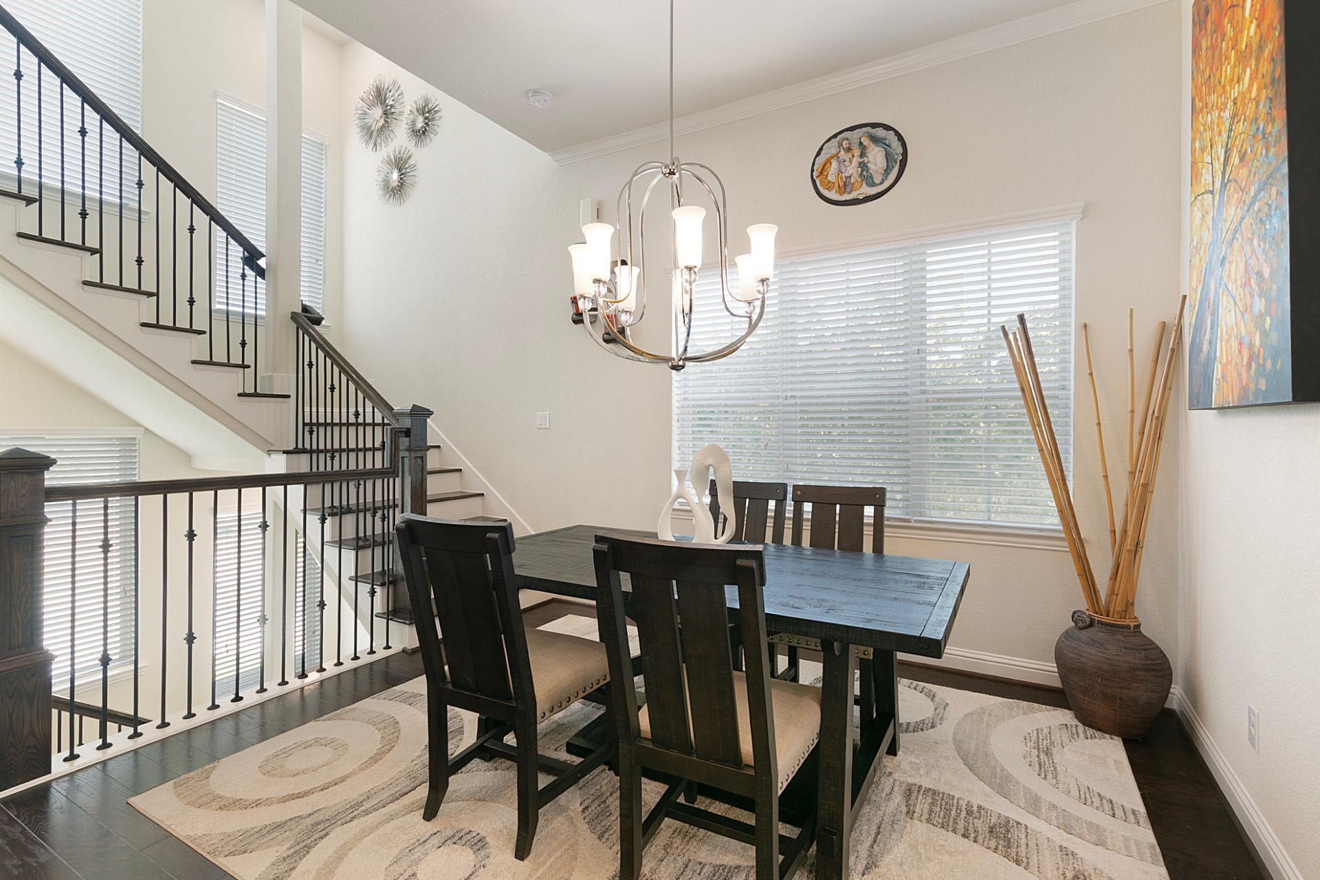 1415 Maple Stream Drive Houston, TX 77043 - Photo 3 of 29 a view of a dining room with furniture and a chandelier