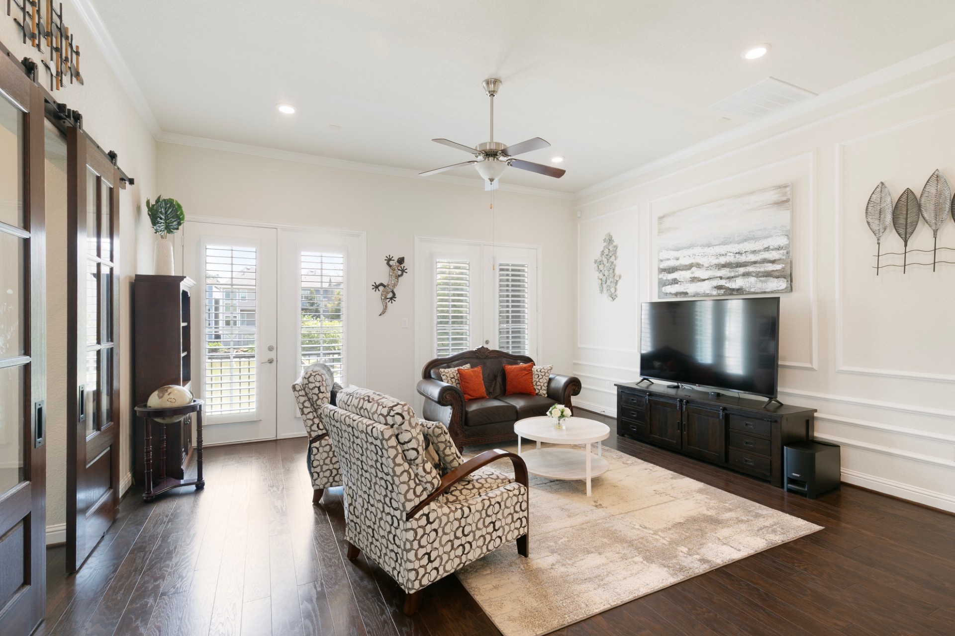 1415 Maple Stream Drive Houston, TX 77043 - Photo 9 of 29 a living room with furniture and a flat screen tv