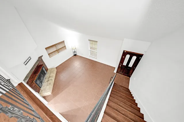 a view of a livingroom with wooden floor