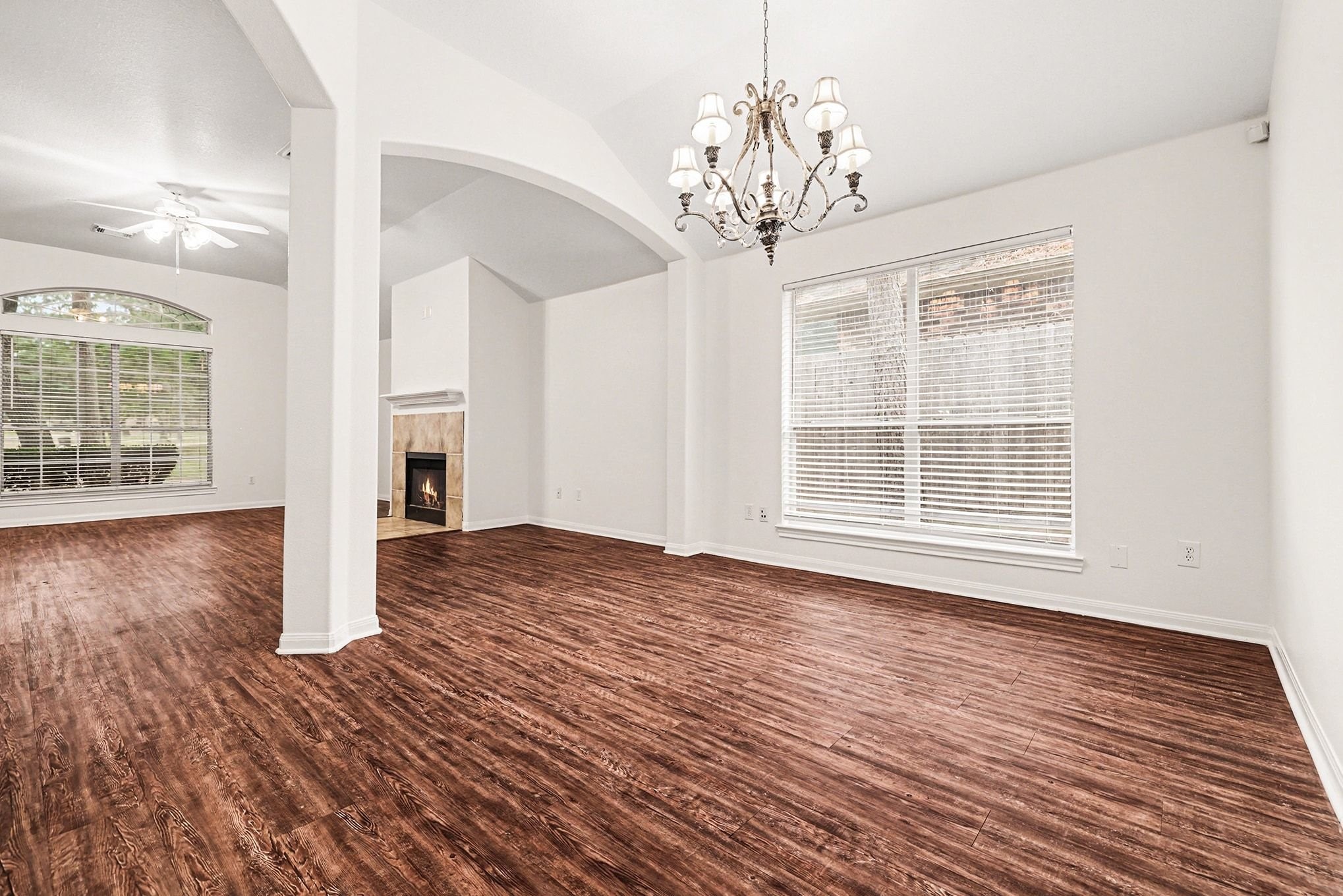 3218 Woodchuck Road Montgomery, TX 77356 - Photo 11 of 27 a view of empty room with wooden floor and window