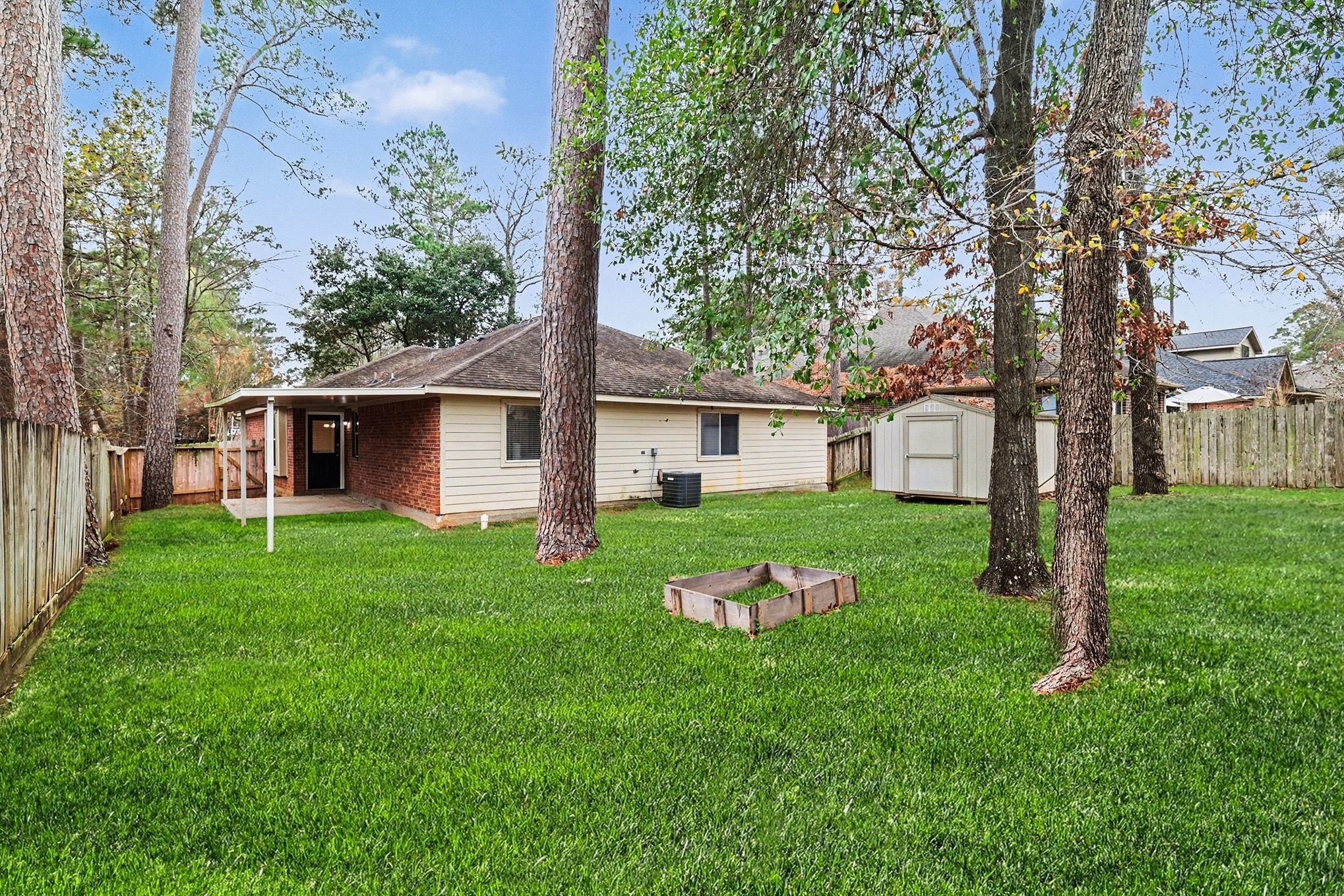 3218 Woodchuck Road Montgomery, TX 77356 - Photo 27 of 27 a front view of house with yard and green space