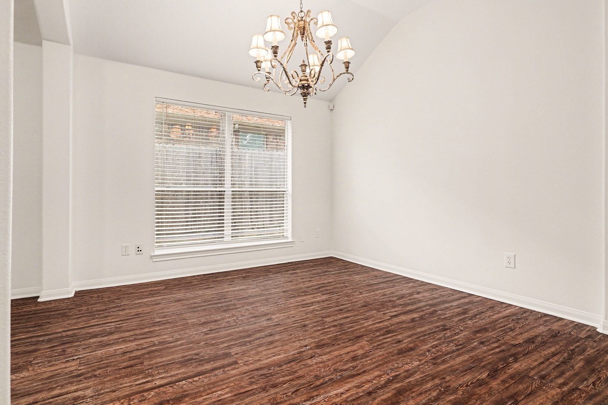 3218 Woodchuck Road Montgomery, TX 77356 - Photo 10 of 27 a view of empty room with wooden floor and fan