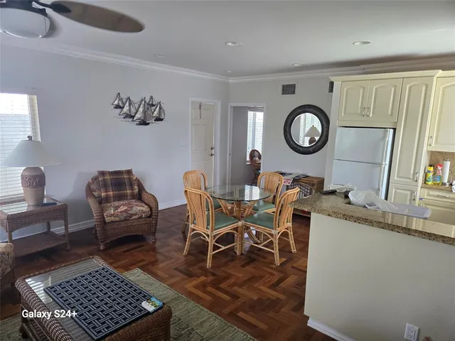 a living room with a couch and a table in it