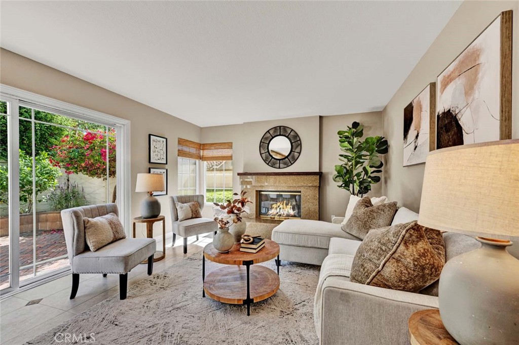 2489 Via Castillo Tustin, CA 92782 - Photo 1 of 30 a living room with furniture and a large window