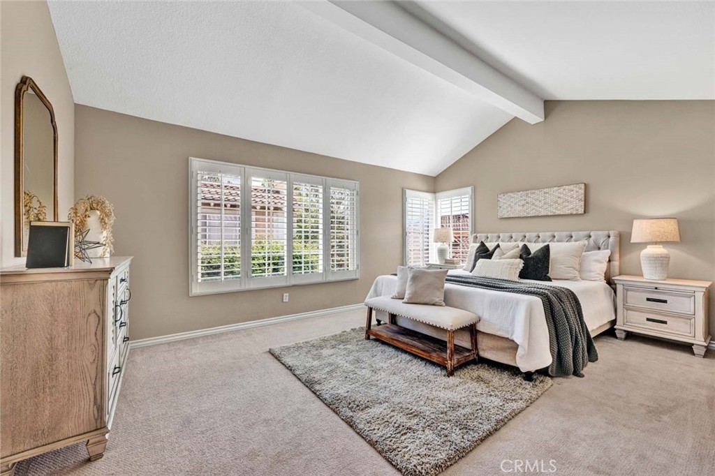 2489 Via Castillo Tustin, CA 92782 - Photo 11 of 30 a bed room with bed and a window