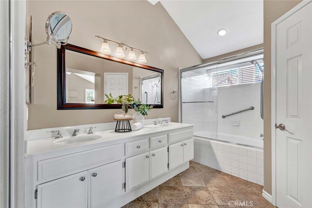 2489 Via Castillo Tustin, CA 92782 - Photo 12 of 30 a bathroom with a double vanity sink mirror and bathtub