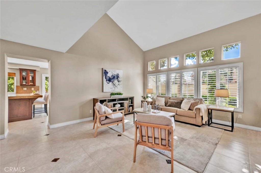 2489 Via Castillo Tustin, CA 92782 - Photo 4 of 30 a living room with furniture and a large window