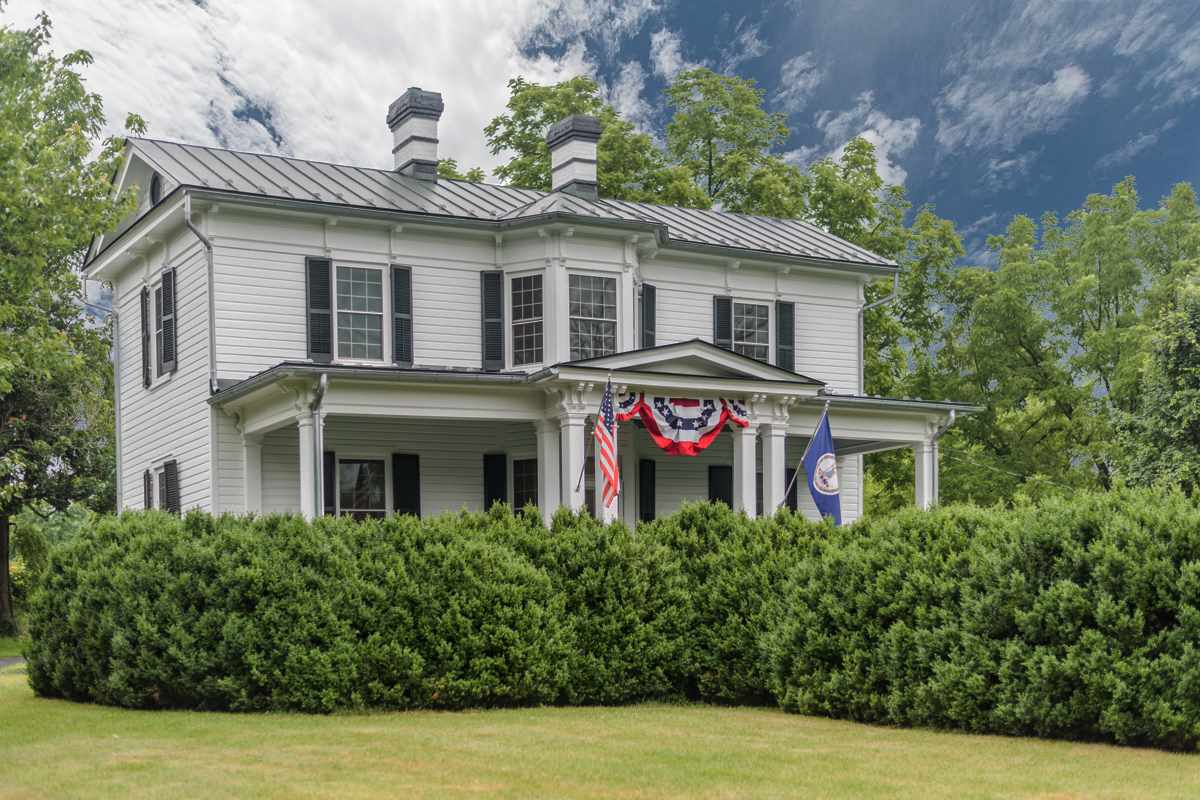 227 Middlebrook Road Staunton, VA 24401 - Photo 1 of 50 a front view of a house with a garden