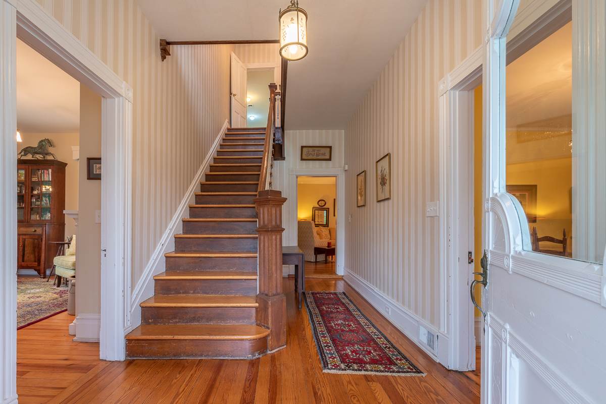 227 Middlebrook Road Staunton, VA 24401 - Photo 15 of 50 a view of a hallway with wooden floor and staircase