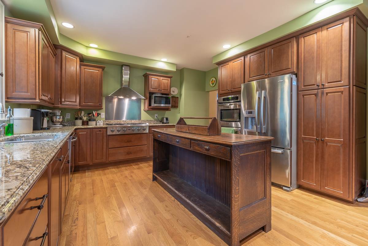 227 Middlebrook Road Staunton, VA 24401 - Photo 22 of 50 a kitchen with stainless steel appliances granite countertop a sink counter space cabinets and a counter top space