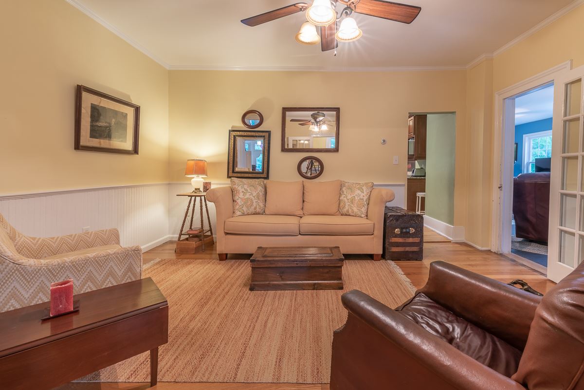 227 Middlebrook Road Staunton, VA 24401 - Photo 28 of 50 a living room with furniture and a flat screen tv