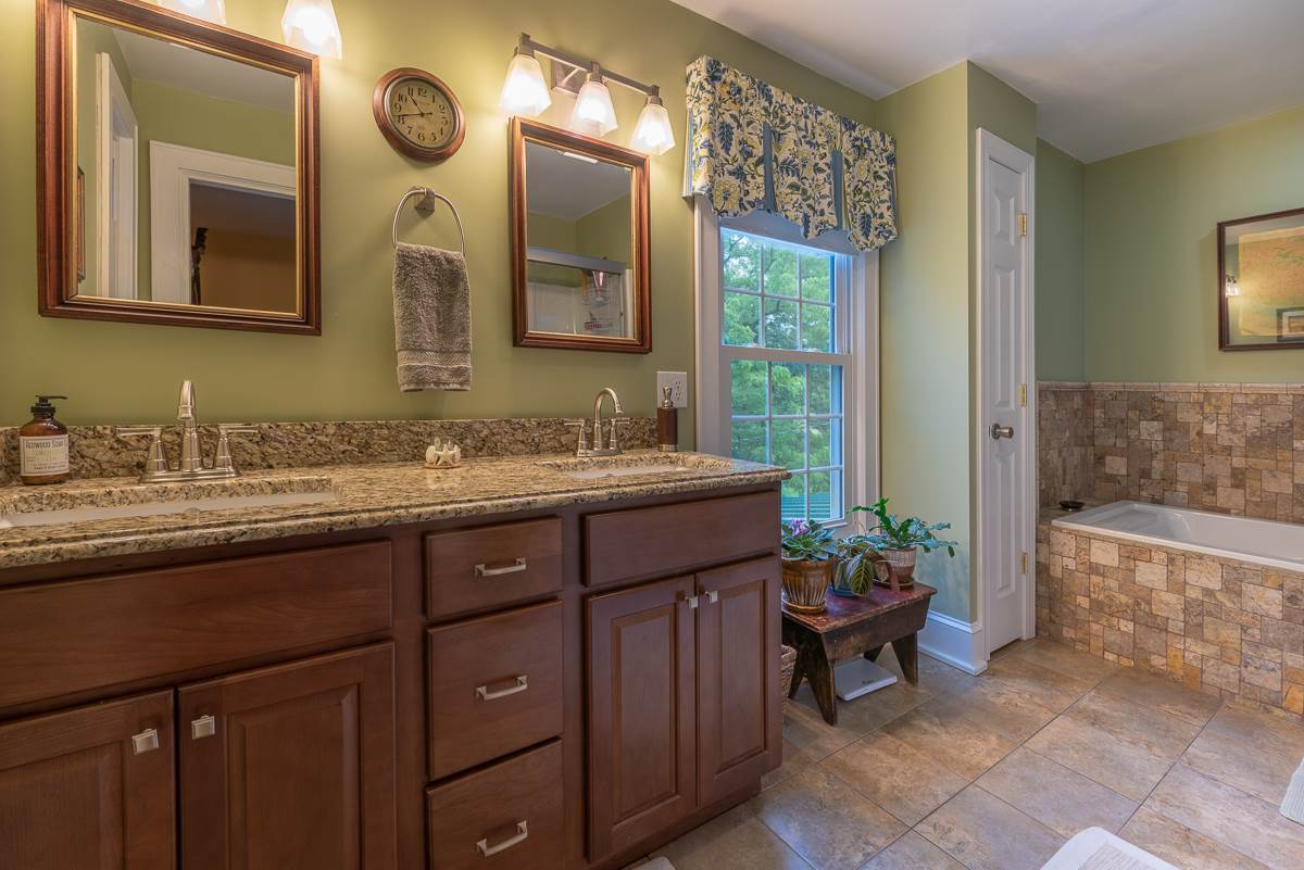 227 Middlebrook Road Staunton, VA 24401 - Photo 40 of 50 a bathroom with a sink and a mirror