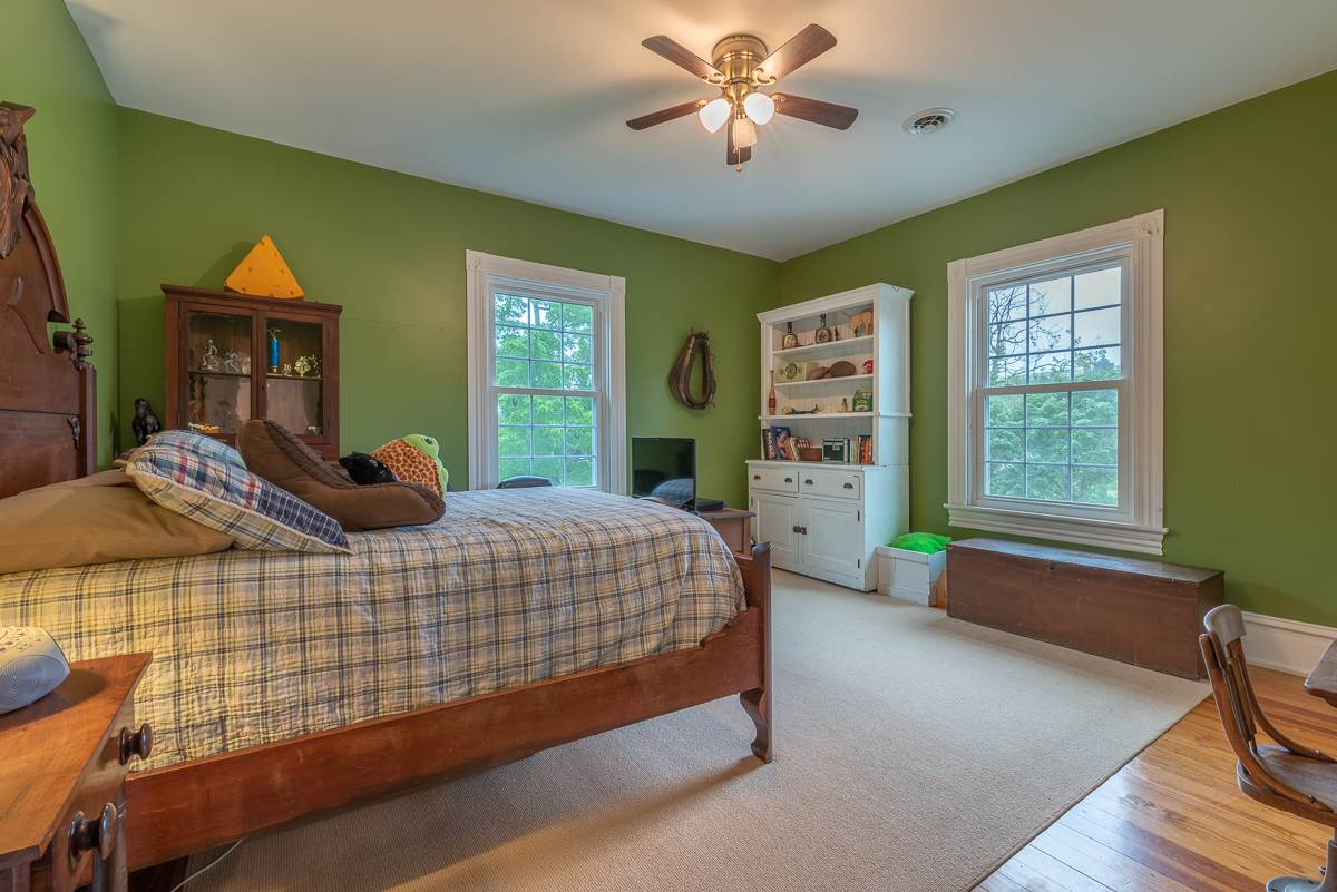 227 Middlebrook Road Staunton, VA 24401 - Photo 47 of 50 a bedroom with a bed and a window