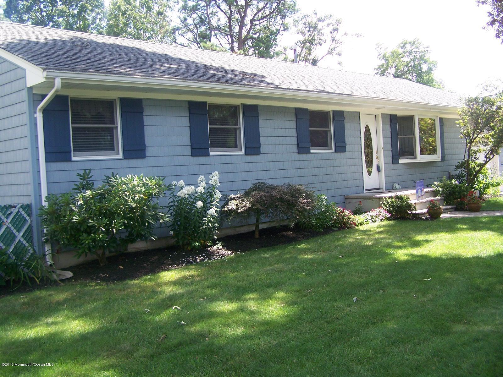 657 Thoroughfare Road Brick, NJ 08724 - Photo 20 of 23 a view of a house with a backyard