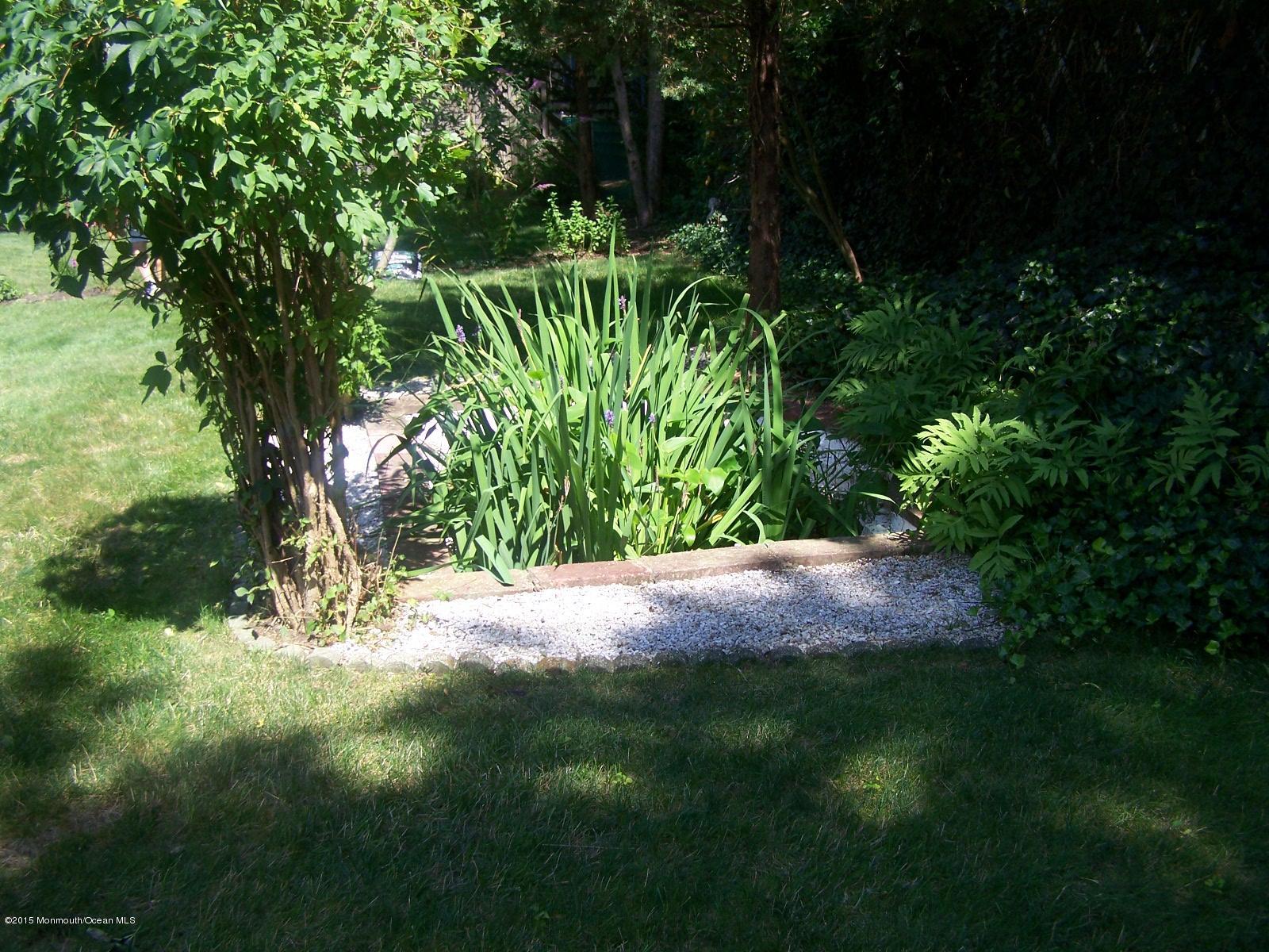 657 Thoroughfare Road Brick, NJ 08724 - Photo 7 of 23 a view of outdoor space and yard