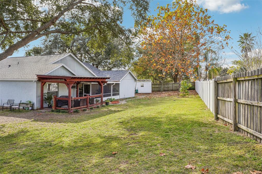 2052 Onecco Court Clermont, FL 34714 - Photo 26 of 33 a view of a house with pool and sitting area