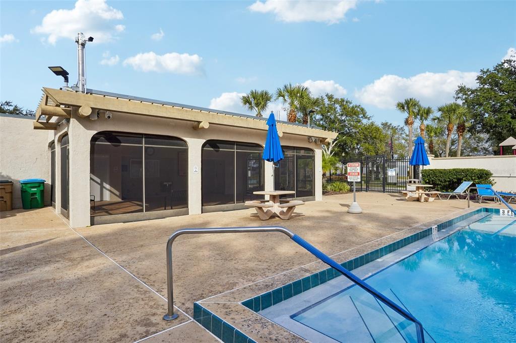 2052 Onecco Court Clermont, FL 34714 - Photo 31 of 33 a view of a house with outdoor space and sitting area