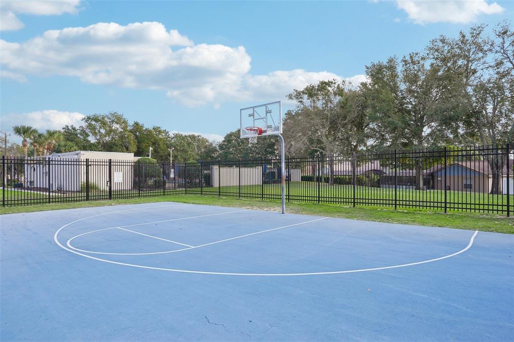 2052 Onecco Court Clermont, FL 34714 - Photo 32 of 33 a view of a tennis court