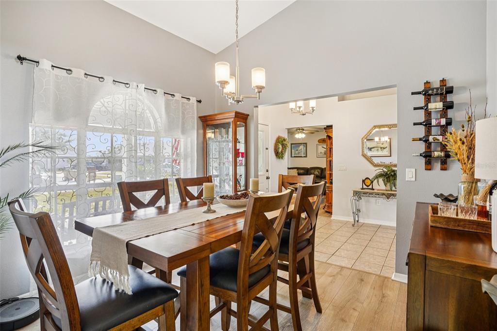2052 Onecco Court Clermont, FL 34714 - Photo 6 of 33 a view of a dining room with furniture and chandelier